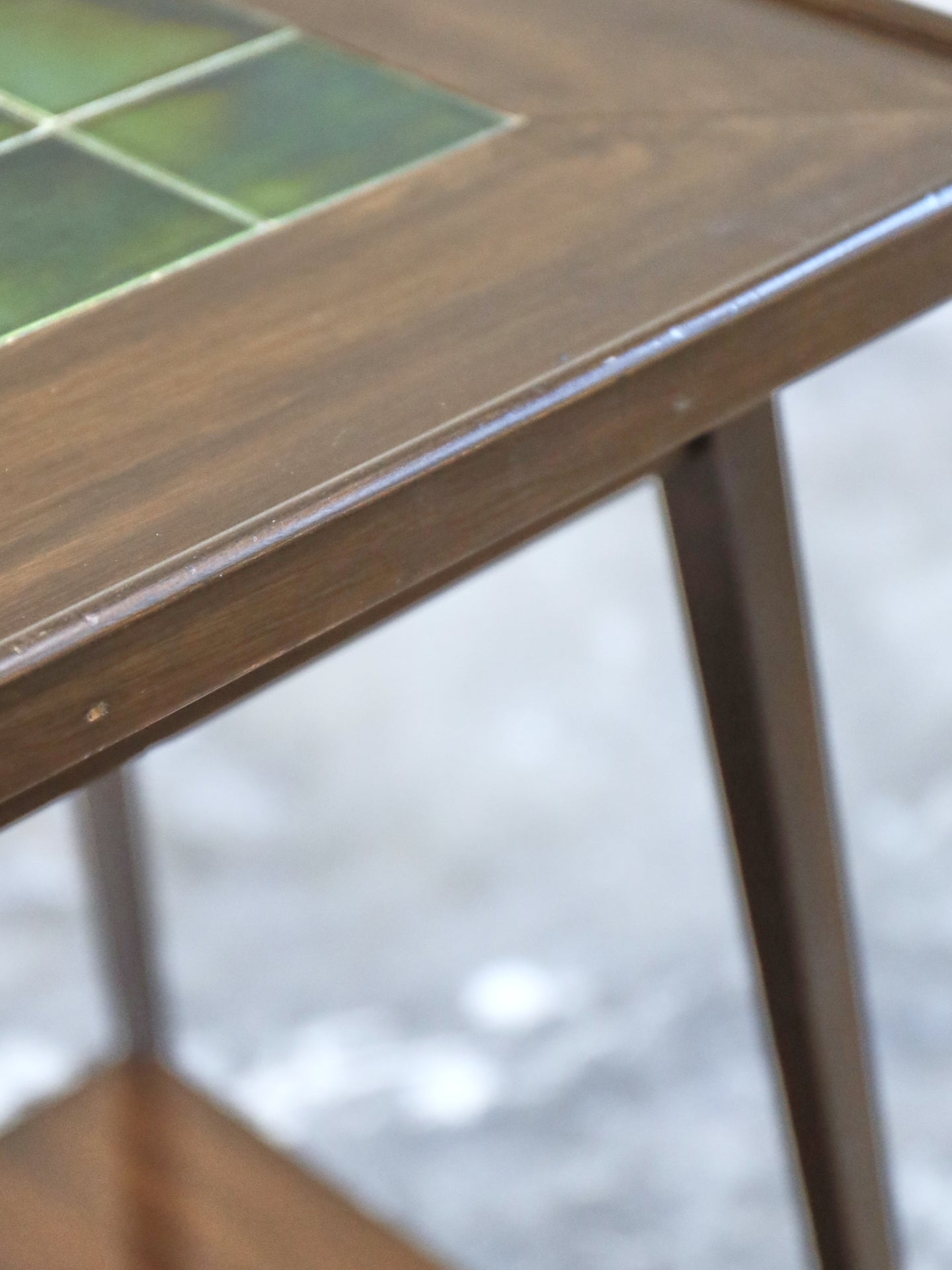 An Arts and Crafts Table with Inset Green Majolica Tiled Top