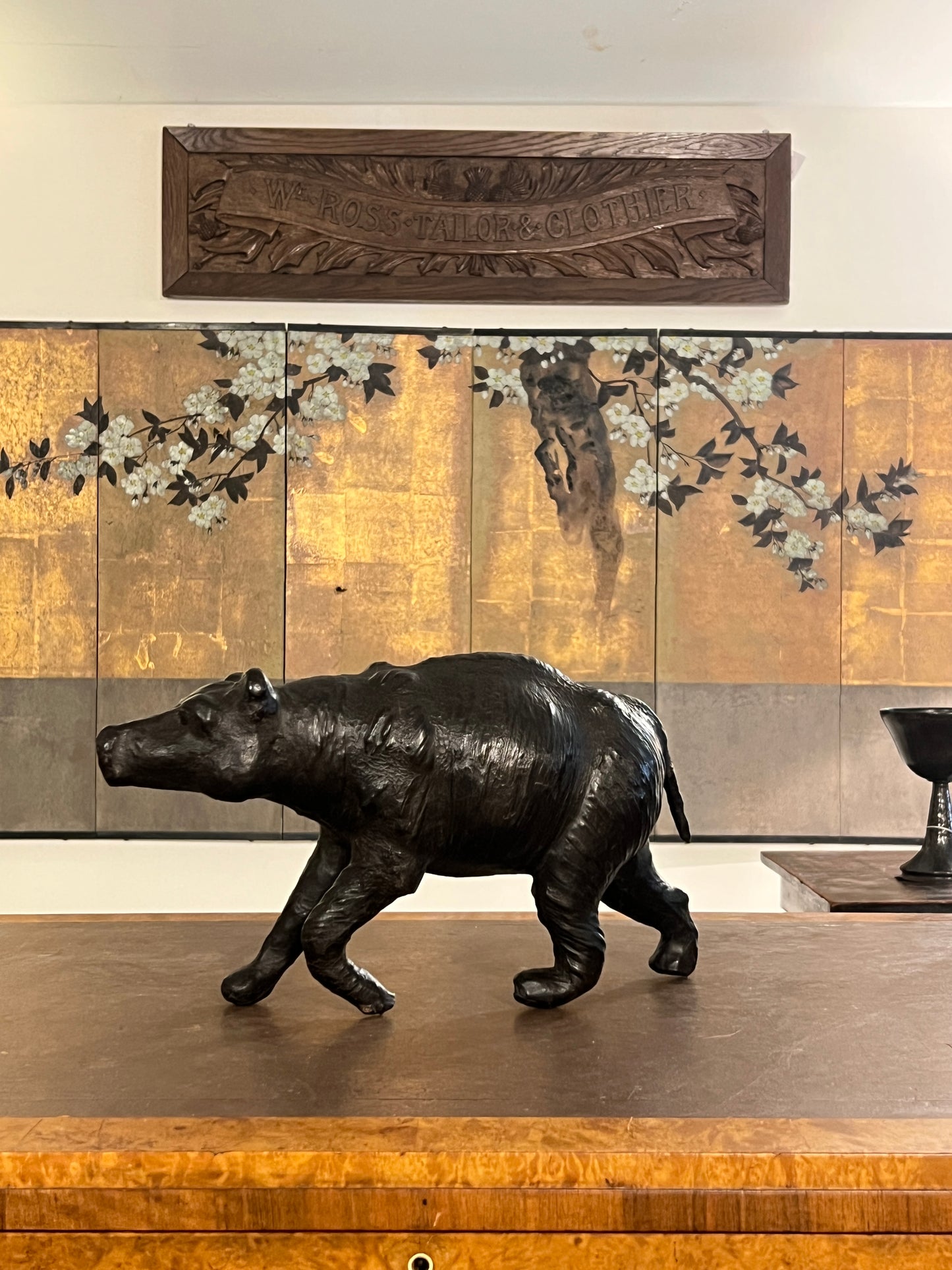A 1960s leather Brown Bear Desk Toy.