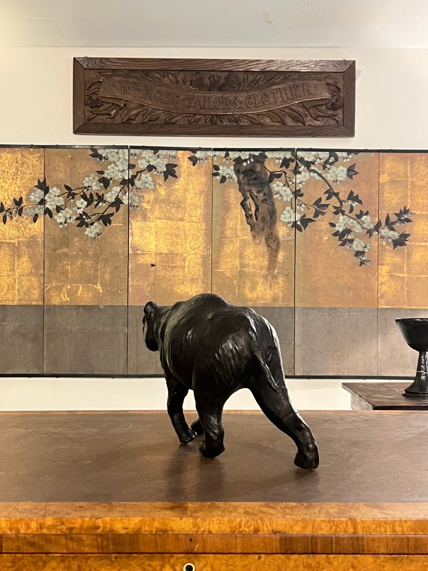 A 1960s leather Brown Bear Desk Toy.
