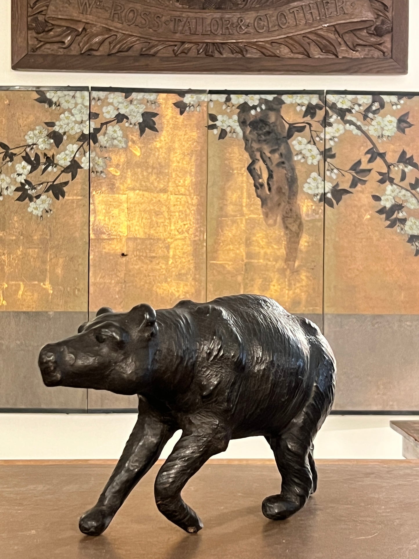 A 1960s leather Brown Bear Desk Toy.
