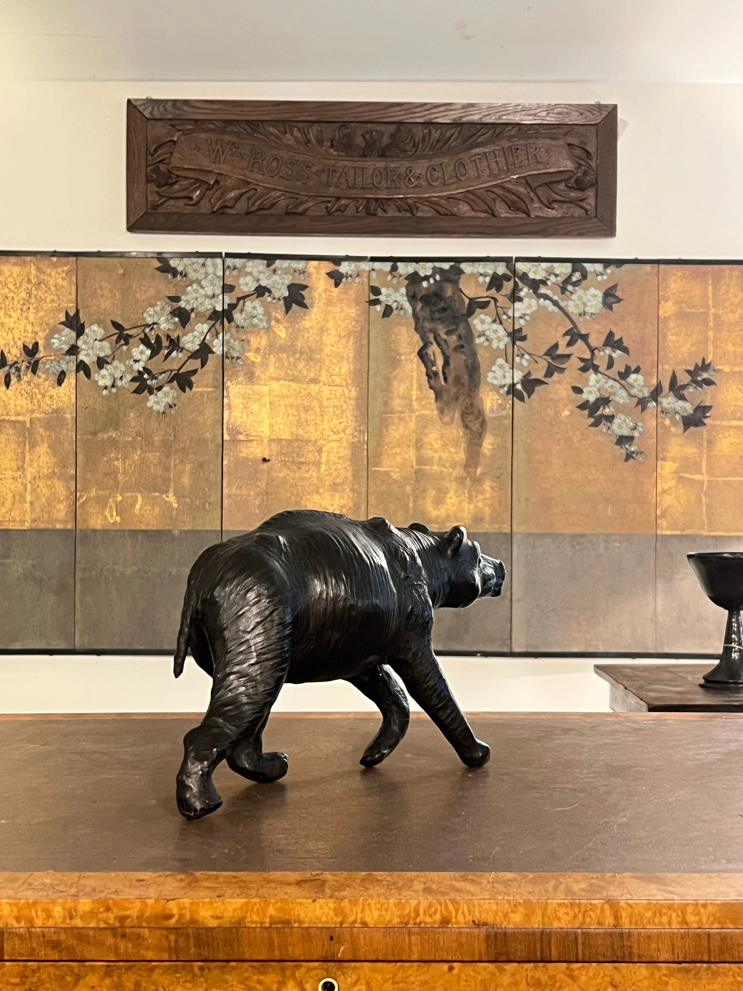 A 1960s leather Brown Bear Desk Toy.