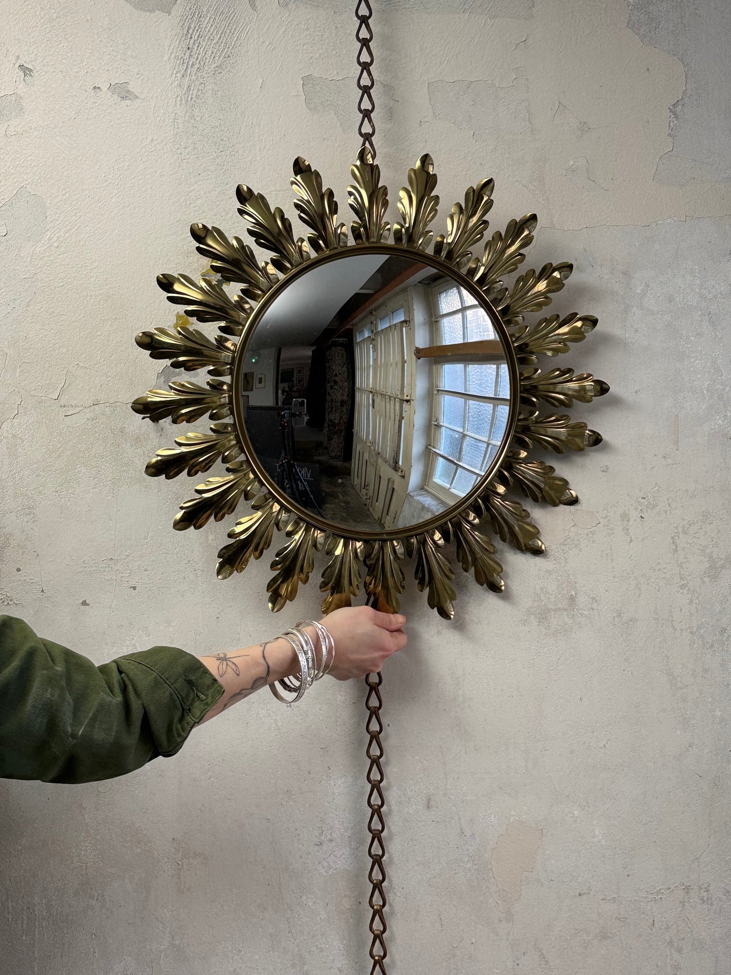 A Round Sunburst Brass Leaf Mirror by Deknudt, 1950’s.