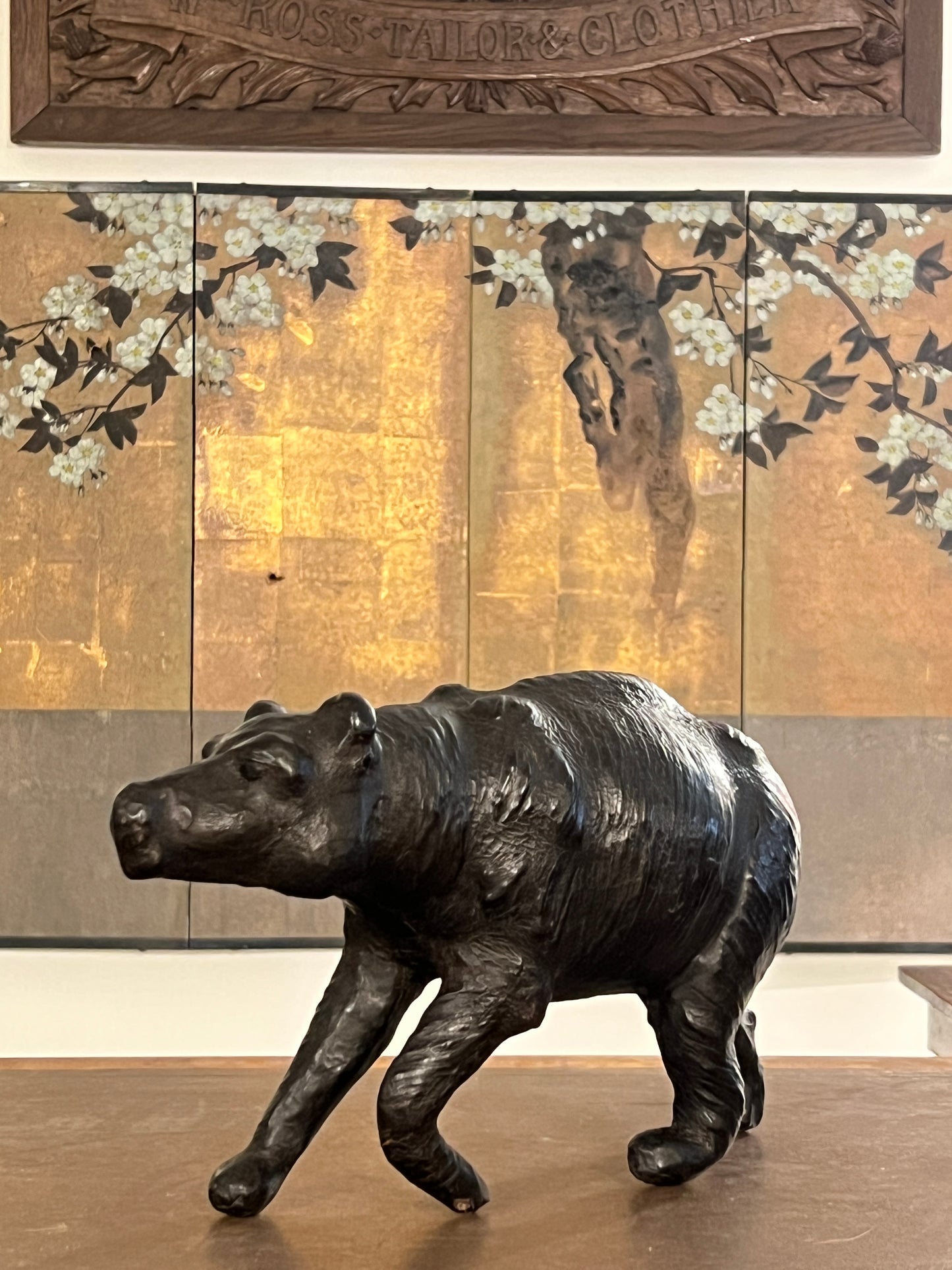 A 1960s leather Brown Bear Desk Toy.