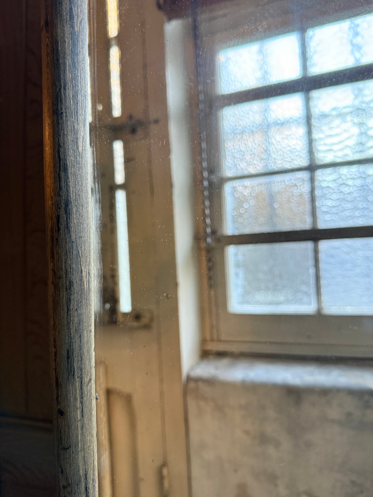 An early 20thC Gents Outfitters or Tailors Mirror