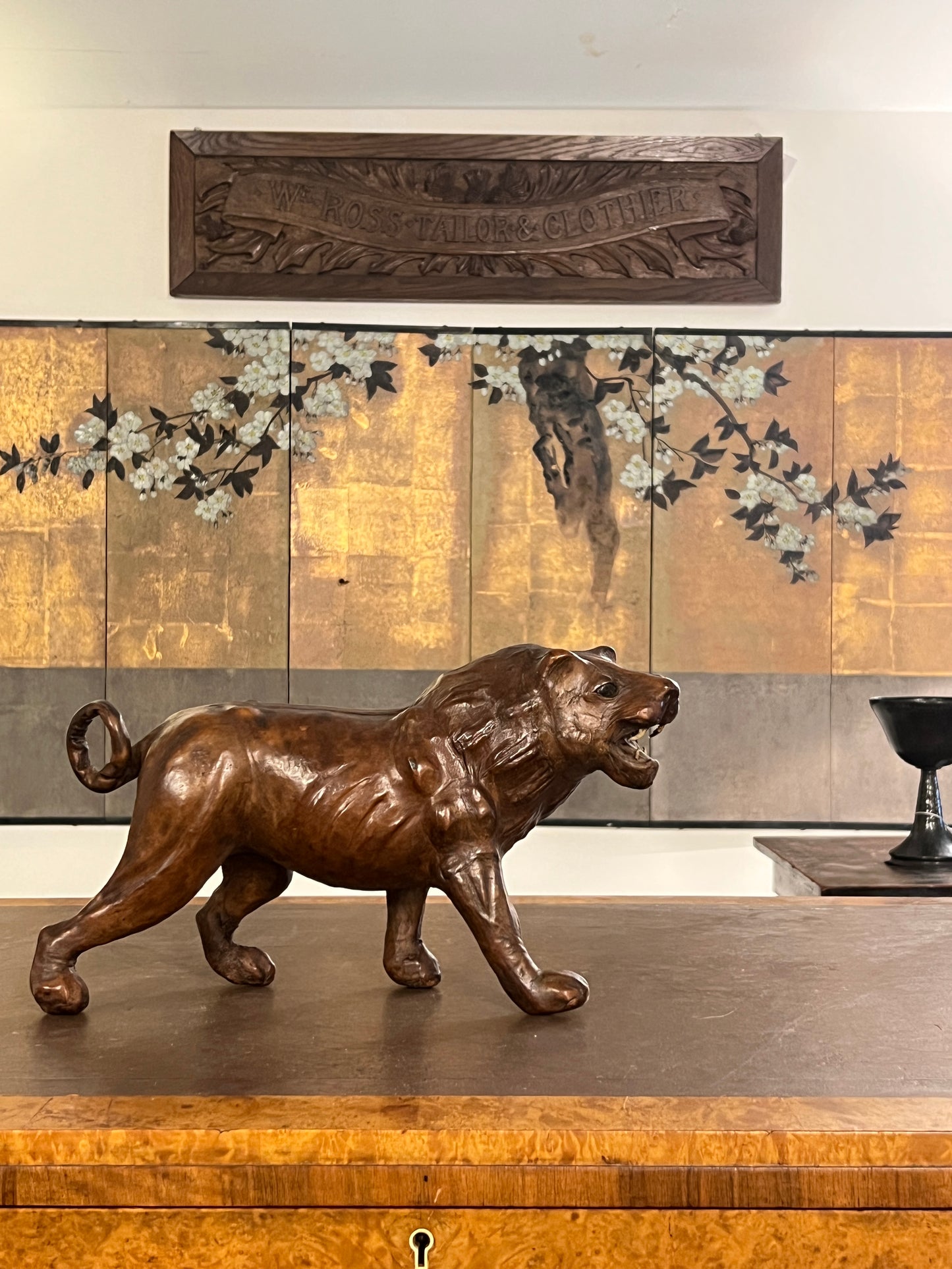 A 1960s leather Lion Desk Toy.