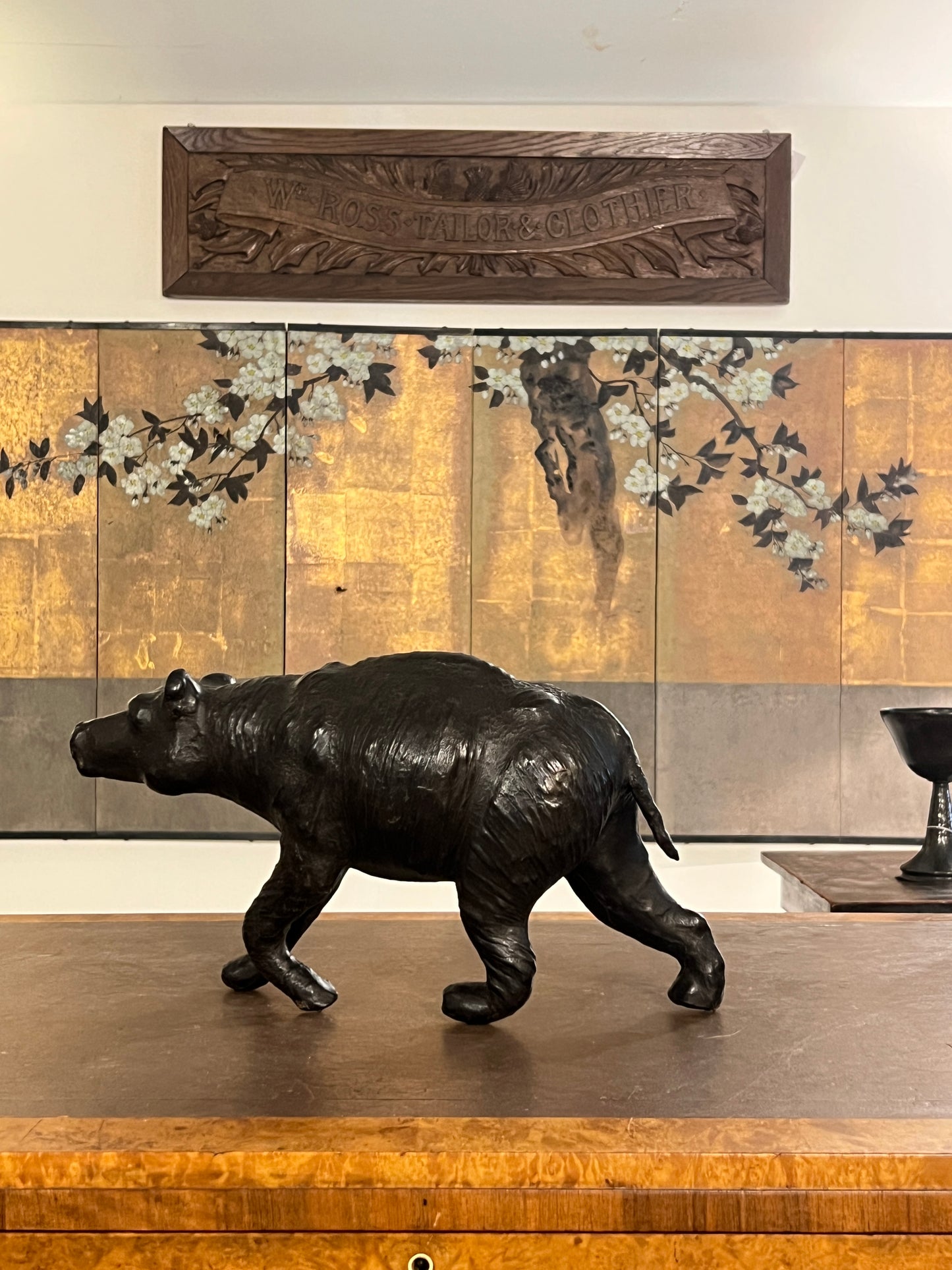 A 1960s leather Brown Bear Desk Toy.