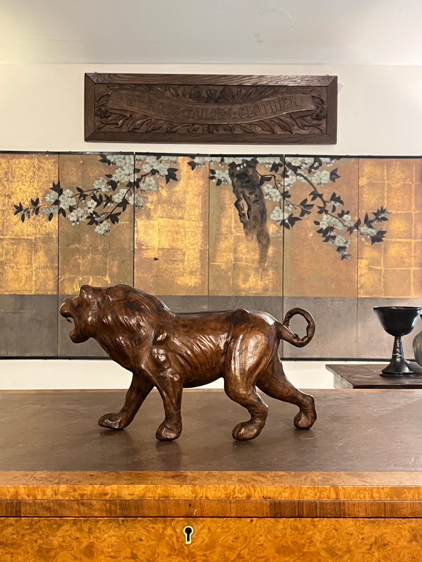 A 1960s leather Lion Desk Toy.