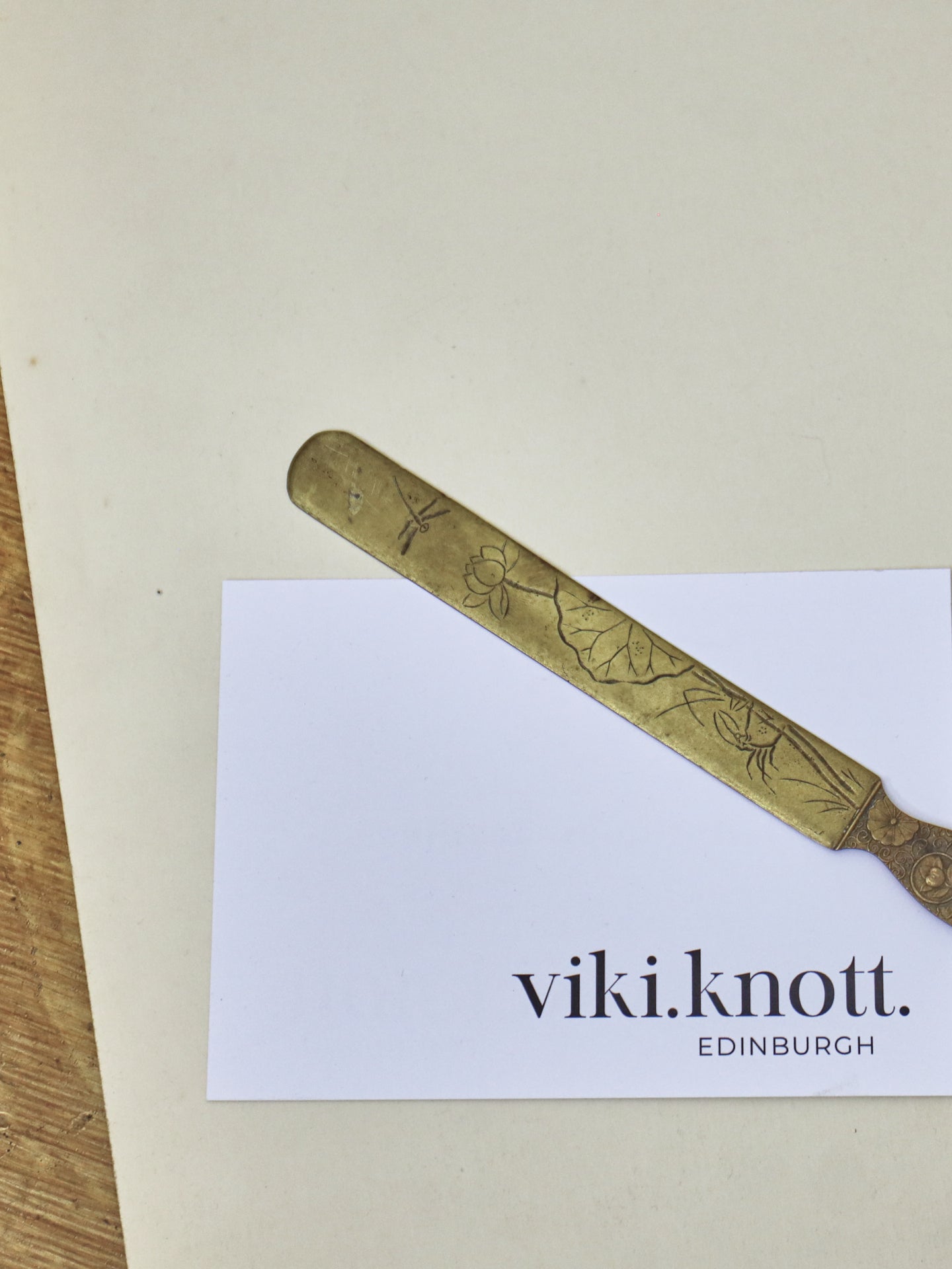 A Japanese brass page turner, Meiji Period (1868-1912) ~ Flowers & Insects