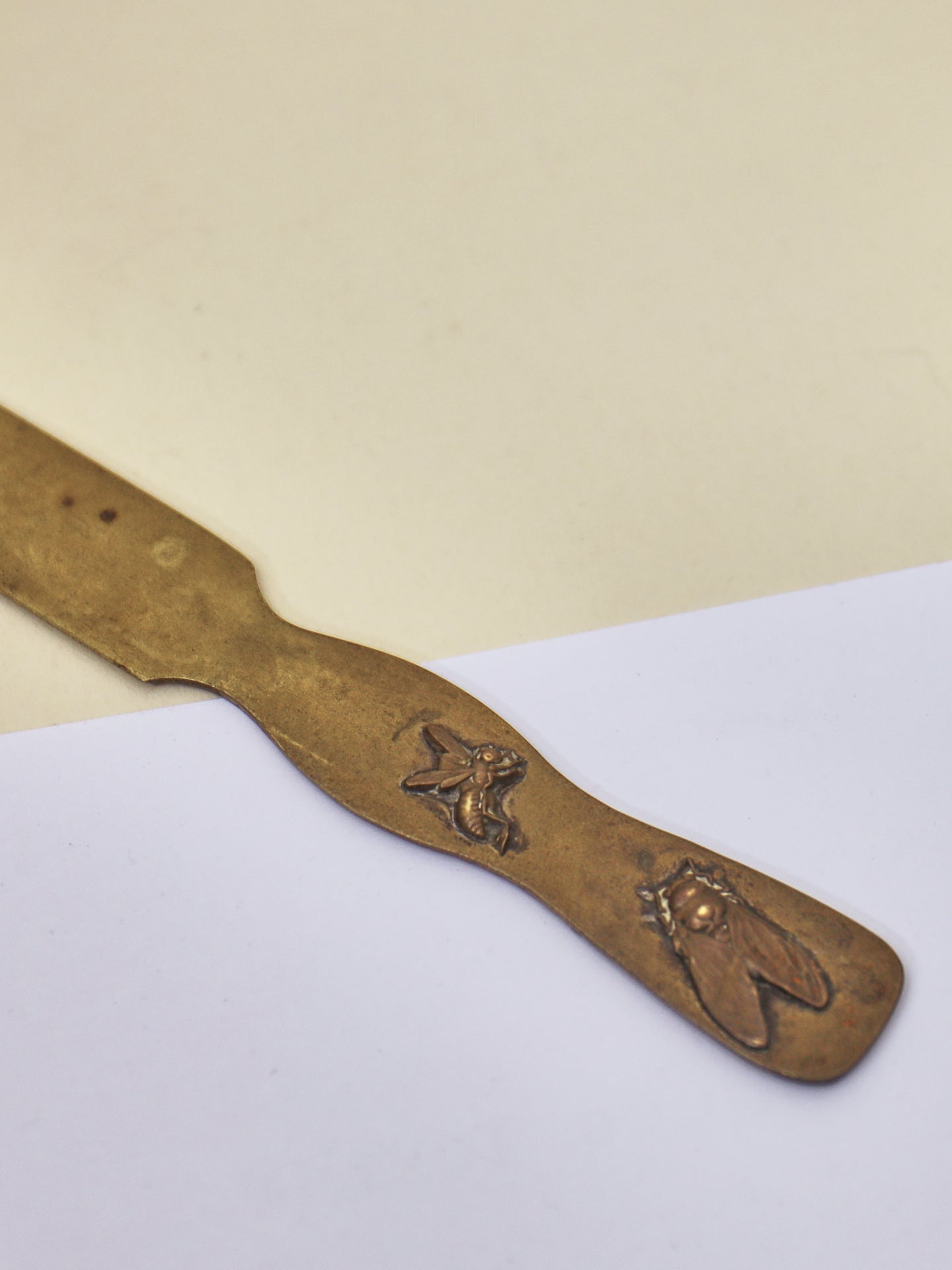 A Japanese brass page turner, Meiji Period (1868-1912) ~ Flowers & Insects