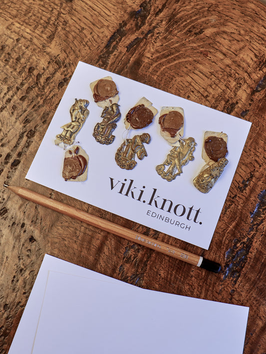 A Collection of Five Small Chinese Figurines - Hat Ornaments