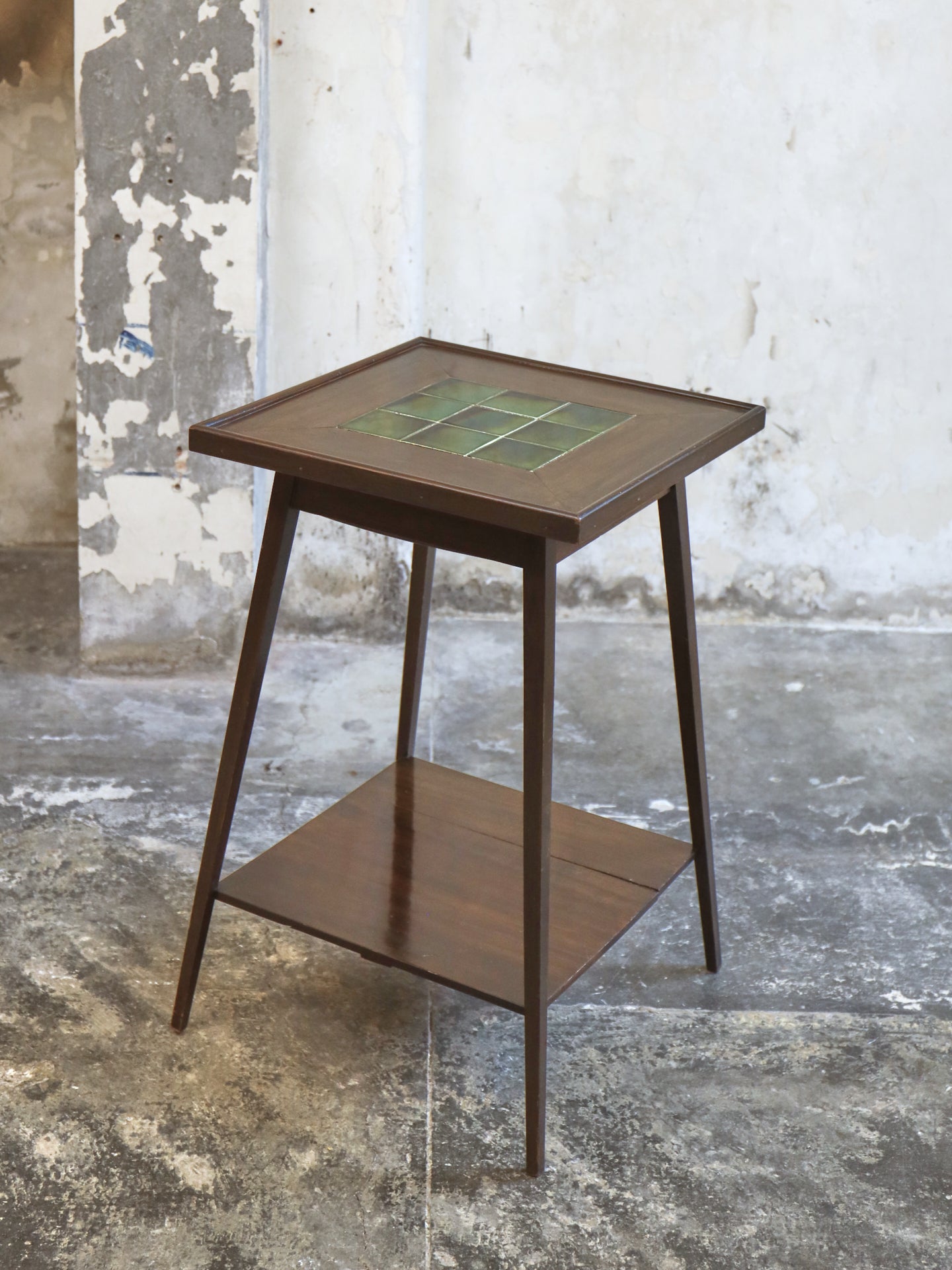 An Arts and Crafts Table with Inset Green Majolica Tiled Top
