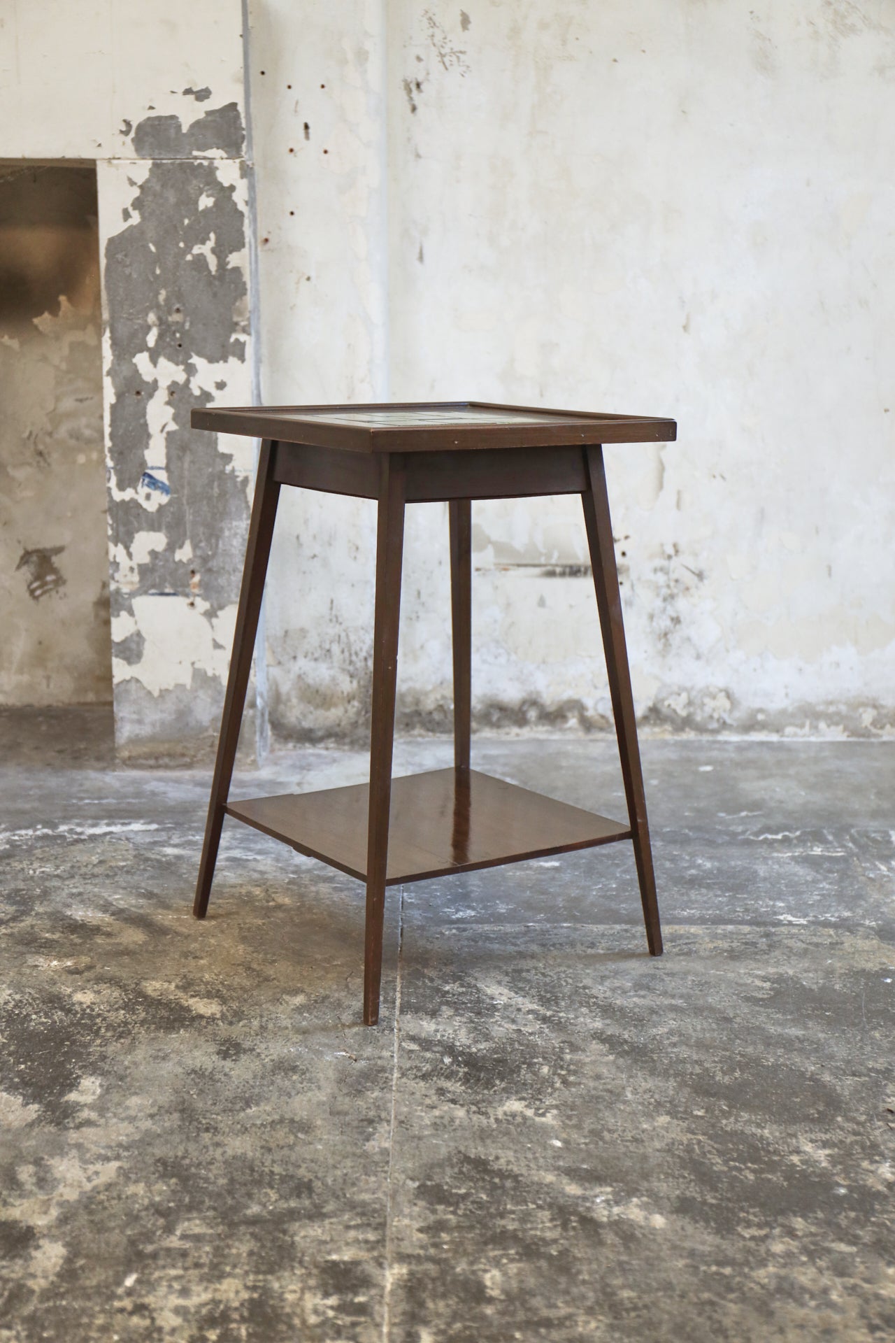 An Arts and Crafts Table with Inset Green Majolica Tiled Top