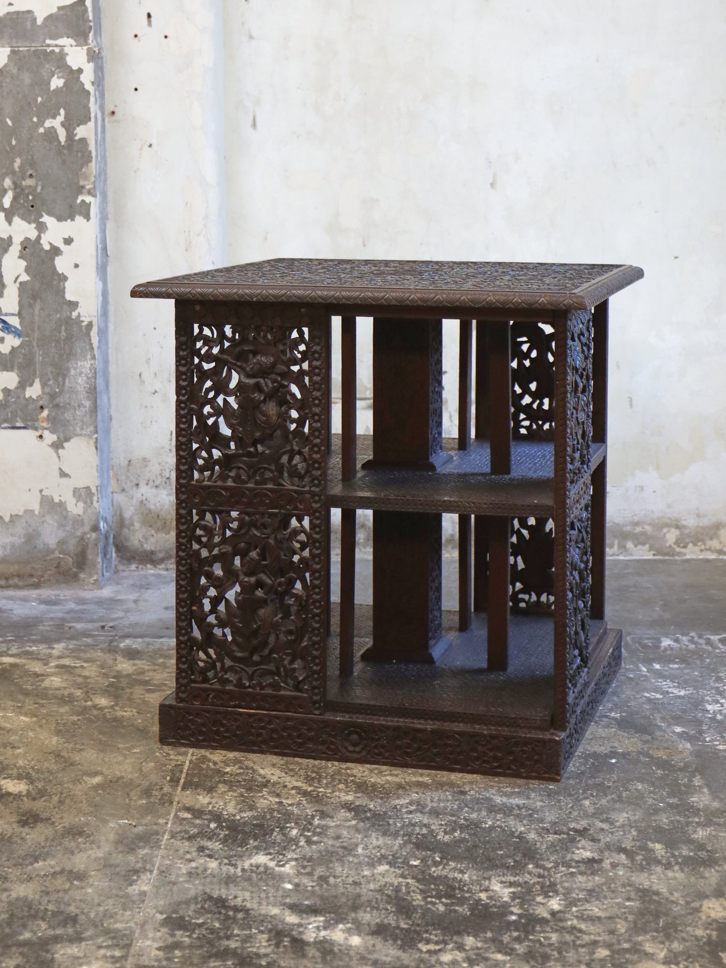 A profusely carved four sided Bookcase - 1920's