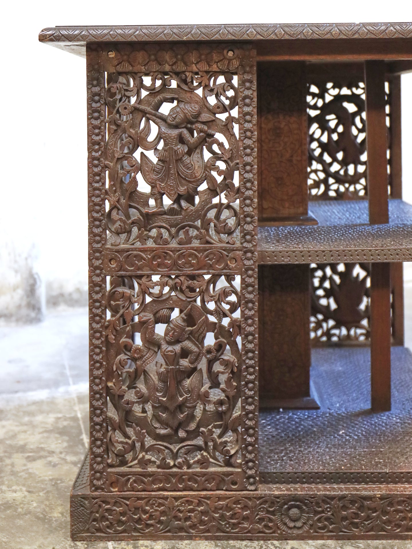 A profusely carved four sided Bookcase - 1920's