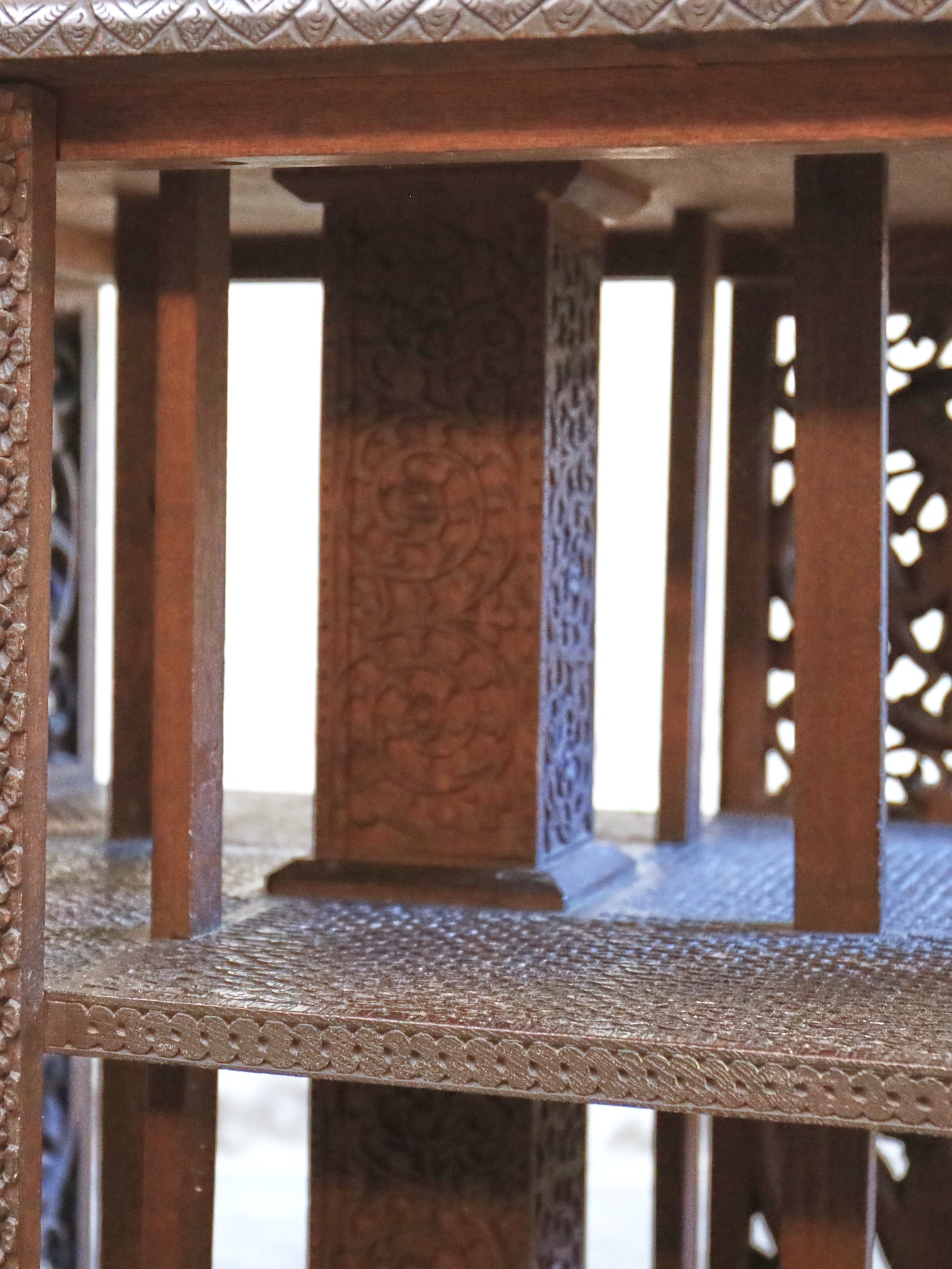 A profusely carved four sided Bookcase - 1920's