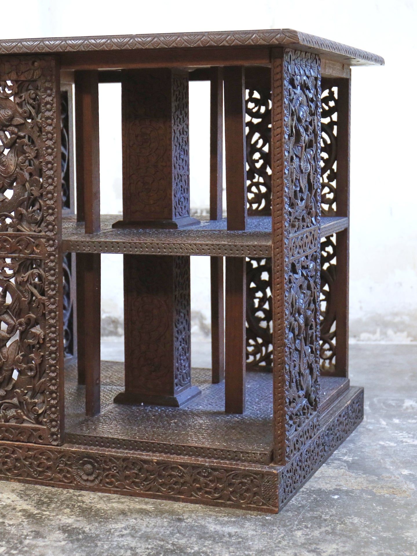 A profusely carved four sided Bookcase - 1920's