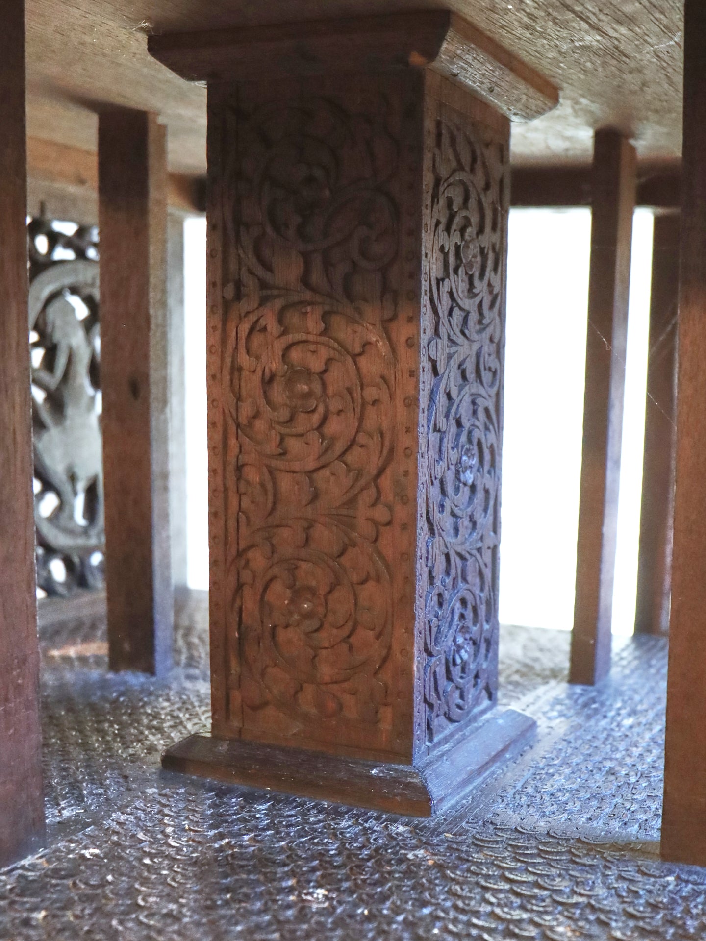 A profusely carved four sided Bookcase - 1920's