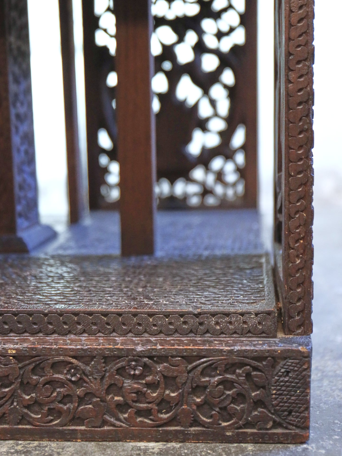A profusely carved four sided Bookcase - 1920's